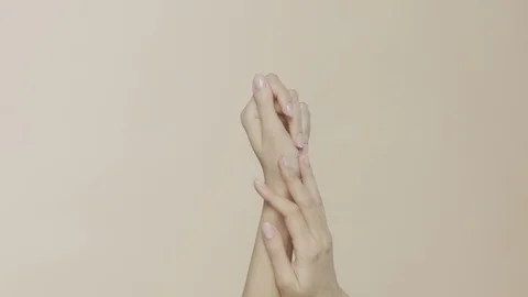 Female hands on simple background Stock-Footage 102264627