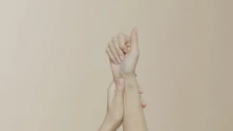 Female hands on simple background Stock-Footage 102264730