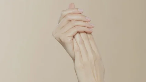 Female hands on simple background Stock-Footage 102304633