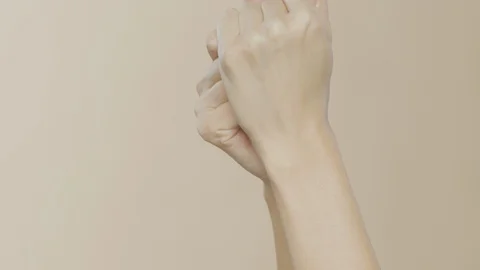 Female hands on simple background Stock-Footage 102304634