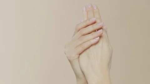 Female hands on simple background Stock-Footage 102323924