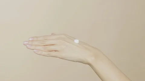 Female hands on simple background Video stock 102324006