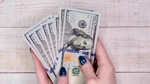 Female Hands Stacking Hundred Dollar Banknotes Stock Footage 337323267