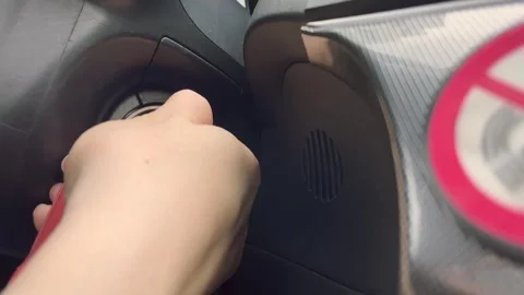 Female hands starting a car engine with a key Stock Footage 252020623