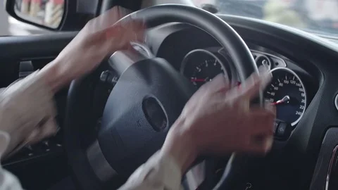 Female Hands of Steering Wheel Stock Footage