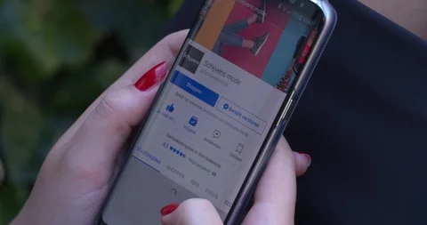 Female hands swiping through website women fashion store Stock Footage 89503230