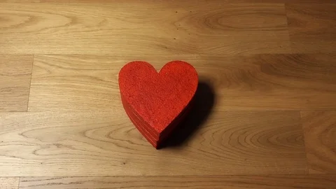 Female hands taking four red heart shapes from the stack. Love, care, Valentine Stock Footage 70581298