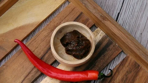 Female Hands Taking Miso Paste from Tray. Top View. Vegan and Vegeterian Food Stock Footage 107177064