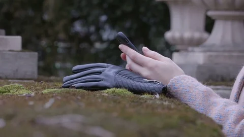 Female hands texting message on smartphone outside, side view Stock Footage 72260406