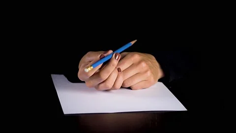 Female hands trying to write a statement Stock Footage 132833858