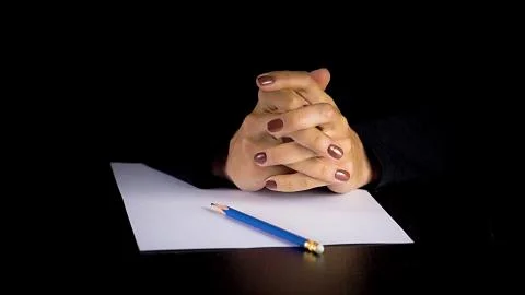 Female hands trying to write a statement. Fotos de archivo