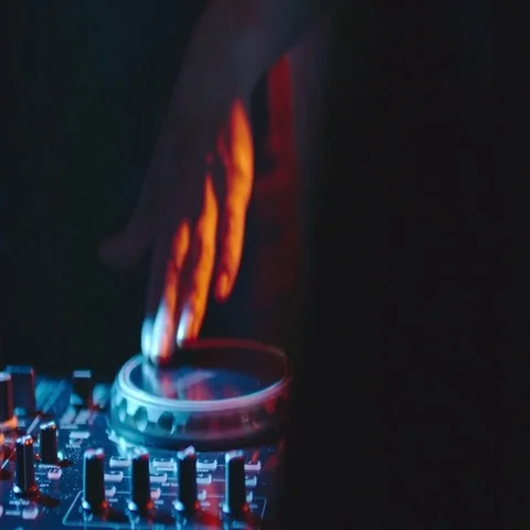 Female Hands Turning Knobs of DJ Mixer Stock Footage 69385322