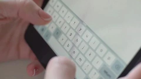 Female hands type message on smartphone with french manicure Stock Footage 333830657