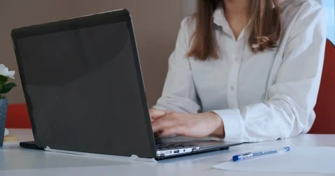 Female hands type text on laptop keyboard, work in office, finished work report Stock Footage 122903777