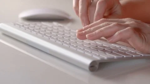 Female hands typing on the computer keyboard Stock Footage 71709641