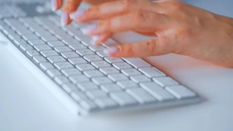 Female hands typing on a computer keyboard. Concept of remote work. Stock Footage 127516782