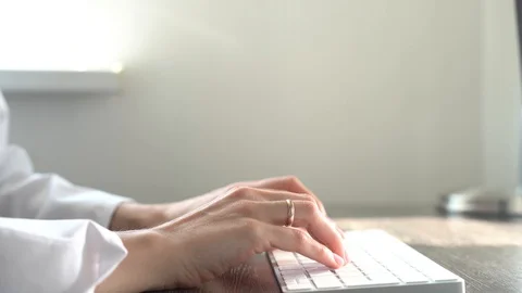 Female hands typing computer keyboard Stock Footage 129142567