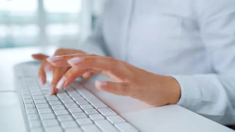 Female hands typing on a computer keyboard. Concept of remote work. Stock Footage 139155199