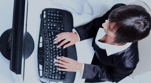 Female hands typing on computer keyboard Stock Photos