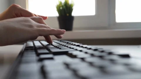 Female hands typing on computer laptop keyboard, remote learning via the Inte Stock Footage 171061340