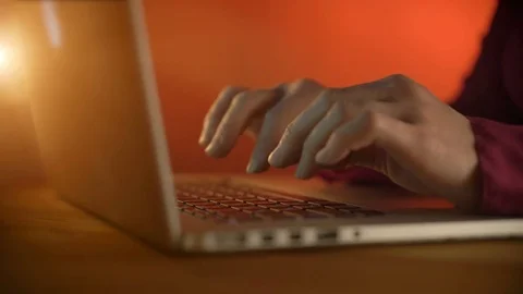 Female hands typing on a keyboard Stock Footage 69976536