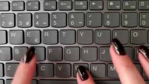 Female hands typing on a laptop Video stock 327870877