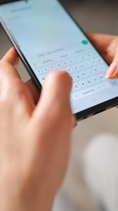 Female hands typing text on smartphone close-up. Stock Footage 346728282