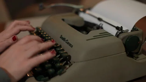 Female hands typing on a typewriter Stock Footage 262452604