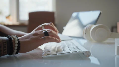 Female Hands Typing on Wireless Keyboard Working Remotely at Desk Stock Footage 348143773