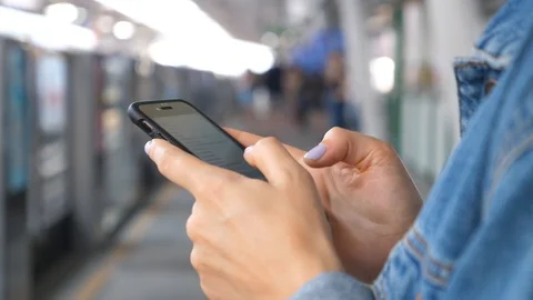 Female Hands Using Cell Phone On City Background. Stock Footage 93264367