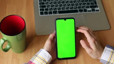 Female hands using chroma-key green screen smartphone mobile. Close up swapping  스톡 동영상 144170131