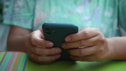 Female hands using phone. Close up of woman hand scrolling on mobile phone. Stock Footage 171401336
