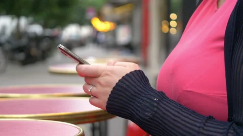 Female hands using a smartphone in 4k slow motion Stock Footage 87808595