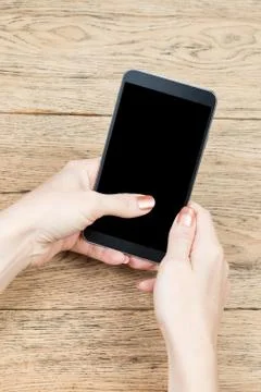 Female hands using a smartphone Stock Photos