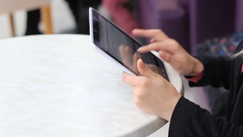 Female hands using tablet closeup Stock Footage 98937175