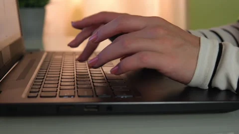 Female hands using text input on laptop keyboard, working online. Close-up Vídeo Stock 156725350