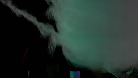 Female Hands Wind an Air Cloud of Cotton Candy from Sugar on a Wooden Stick. 4K Stock Footage 156410357