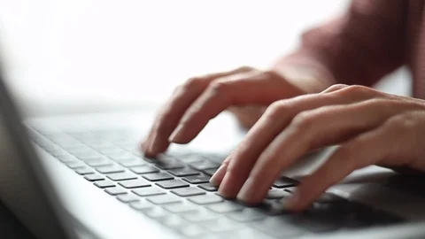 Female hands work on a laptop keyboard. Stock Footage 119152000