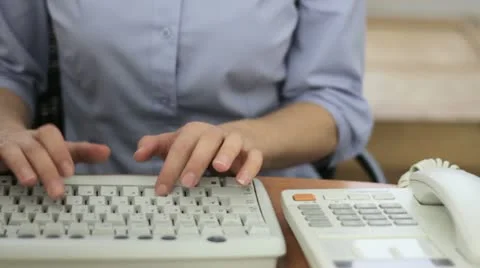 Female hands working on computer keyboard and dialing the number, close up HD Stock Footage 22041536