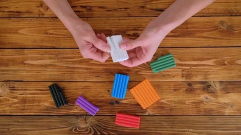 Female hands working with polymer clay Stock Footage 84223473