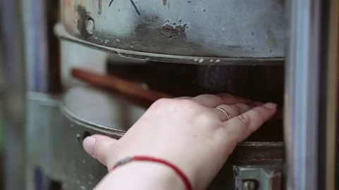 Female hands working on a press machine and manufacturing parts Stock Footage 213726670