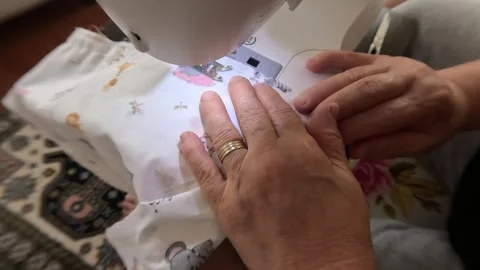 Female Hands Working Sewing Machine Ambient Stock Footage 339952540
