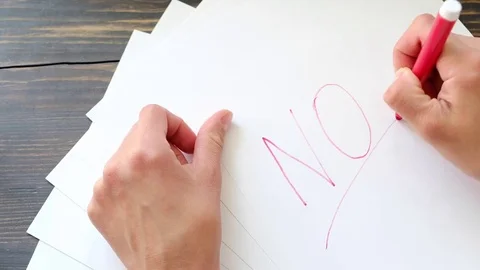 Female hands writing negative answer Stock Footage 76153996