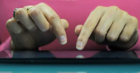 Female hands of a young girl writes a letter by email on the tablet. Stock Footage 81664053