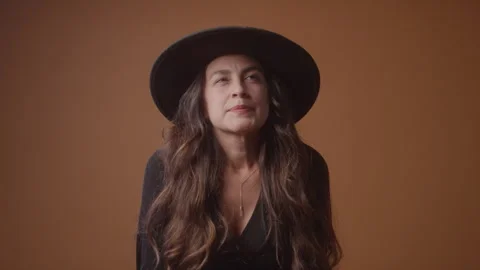 Female in a Hat Thinking and Smiling Stock Footage 270300272