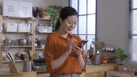 Female is having fun browsing social media feeds Stock Footage 140149380