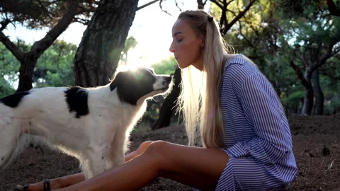 Female having fun with the dog Stock Footage 282089523
