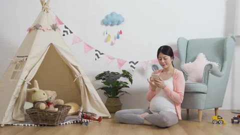 Female having fun taking selfie in playroom Video stock 133695462