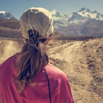 Female hiker deciding which path to take Stock Photos