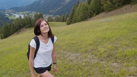 Female hiker using smart watch while walking Stock Footage 137486785